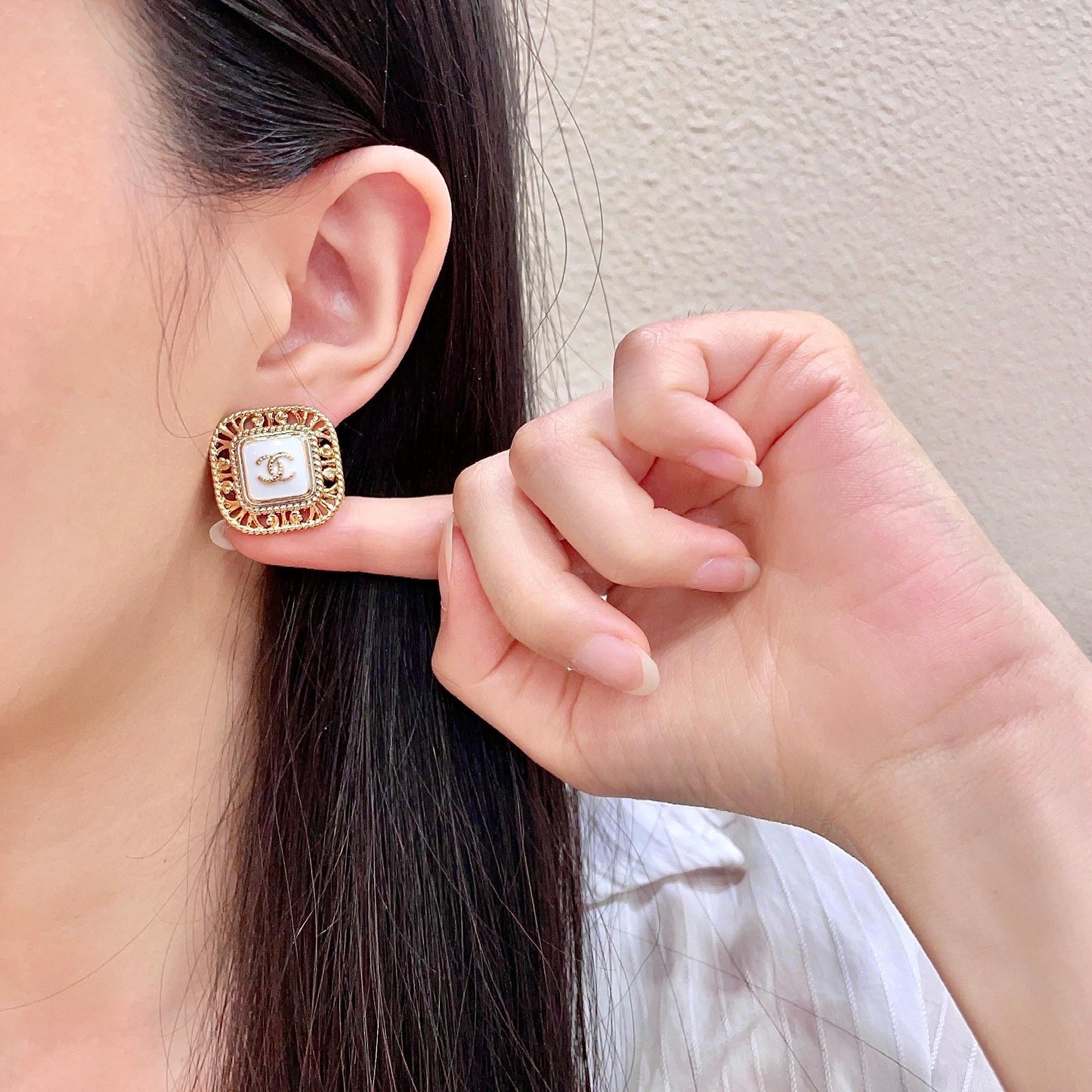 Double-C Emblem Stud Earrings in Polished Metal-Tone – Design 139 front product view