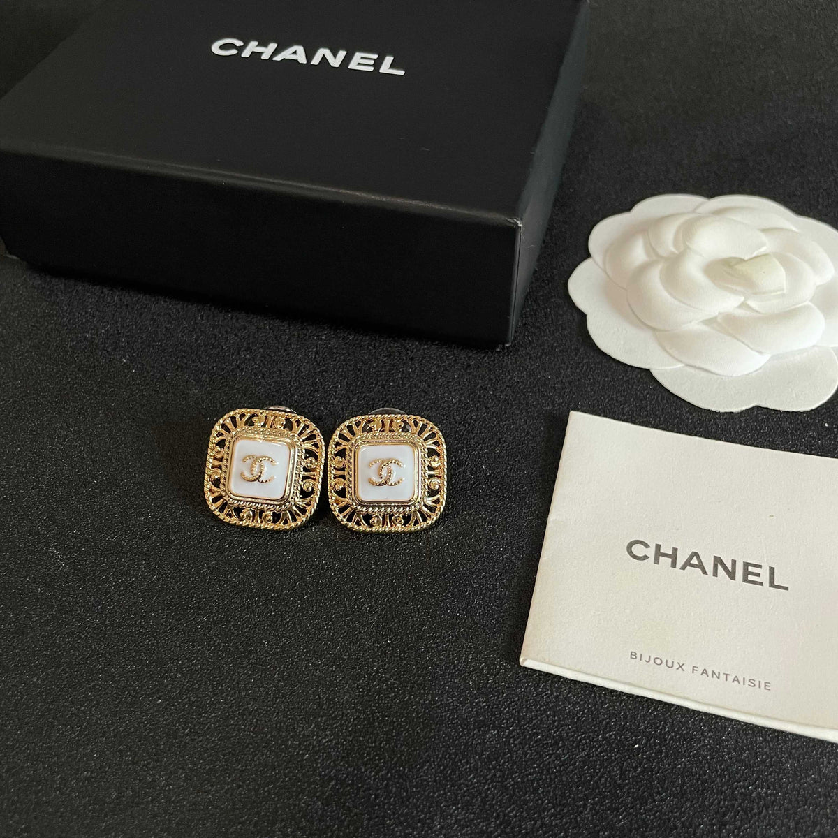 Double-C Emblem Stud Earrings in Polished Metal-Tone – Design 139 close-up detail