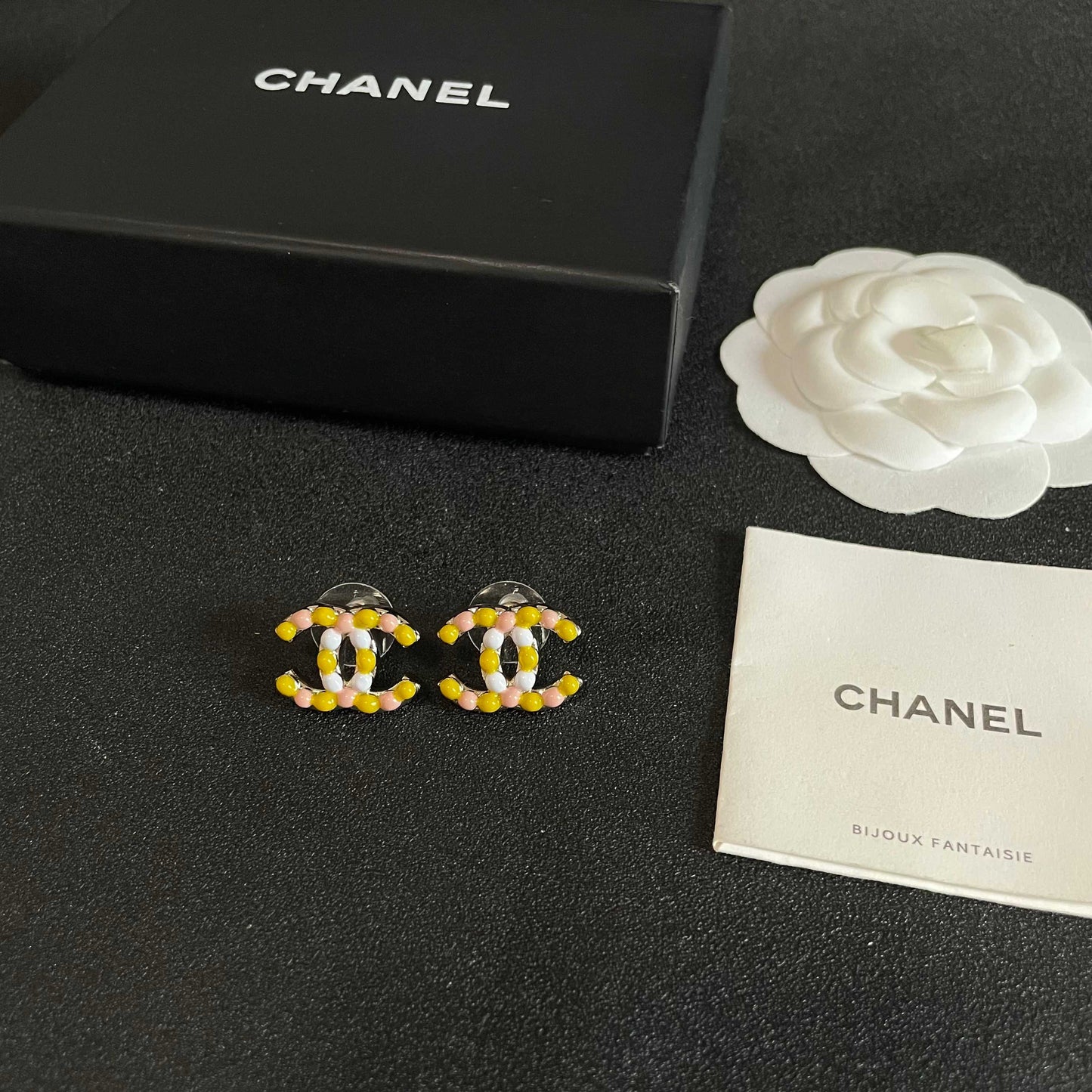 Double-C Emblem Stud Earrings in Polished Metal-Tone – Design 135 close-up detail