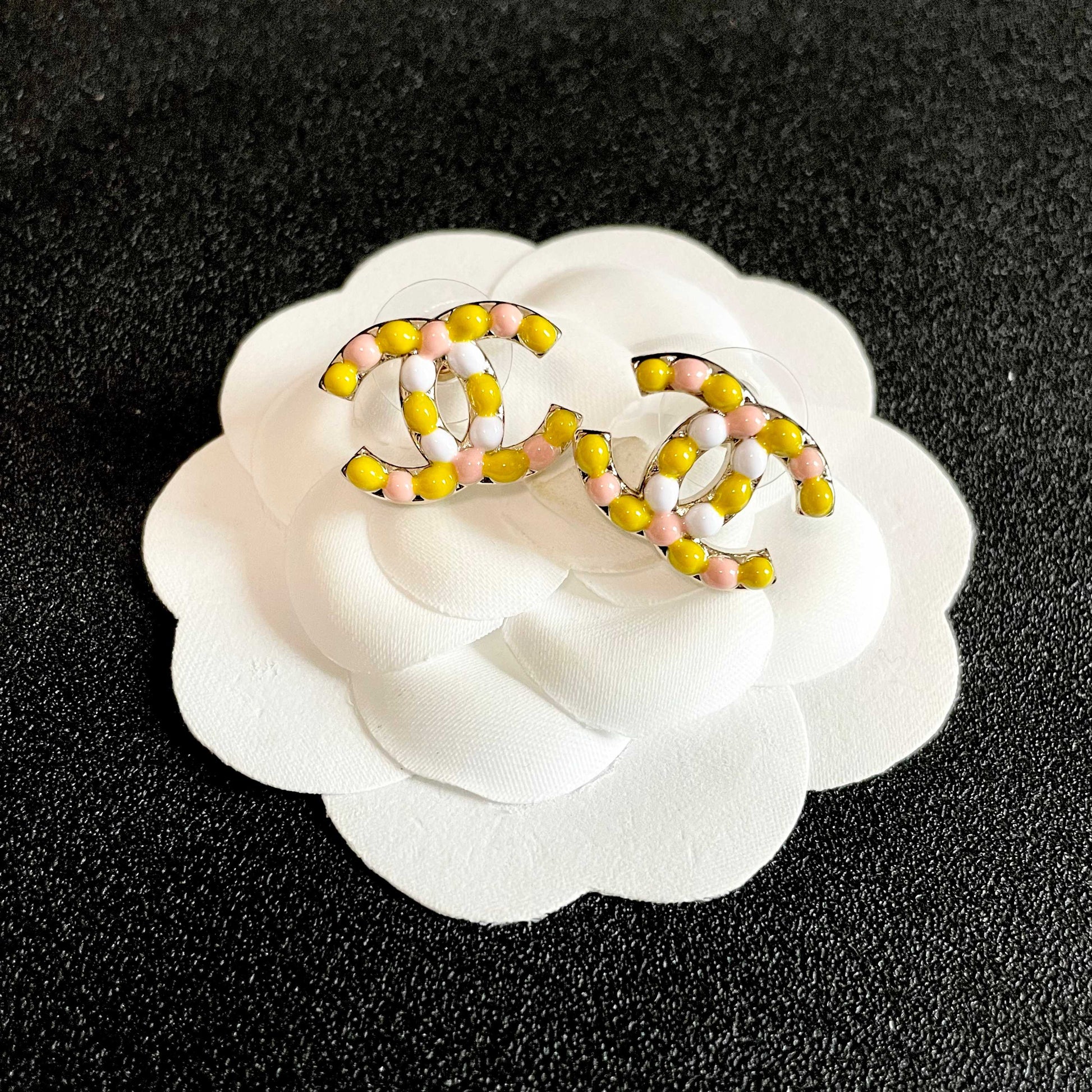 Double-C Emblem Stud Earrings in Polished Metal-Tone – Design 135 front product view