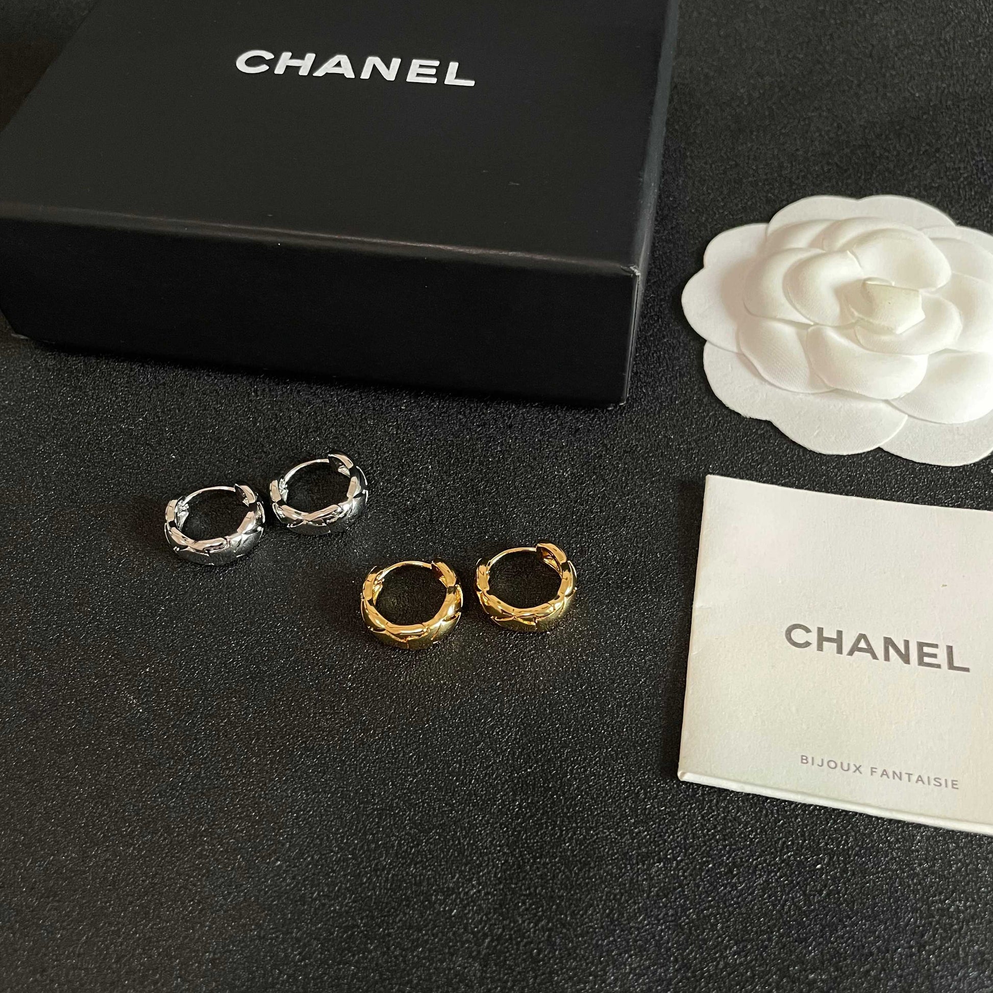 Double-C Emblem Stud Earrings in Polished Metal-Tone – Design 129 close-up detail