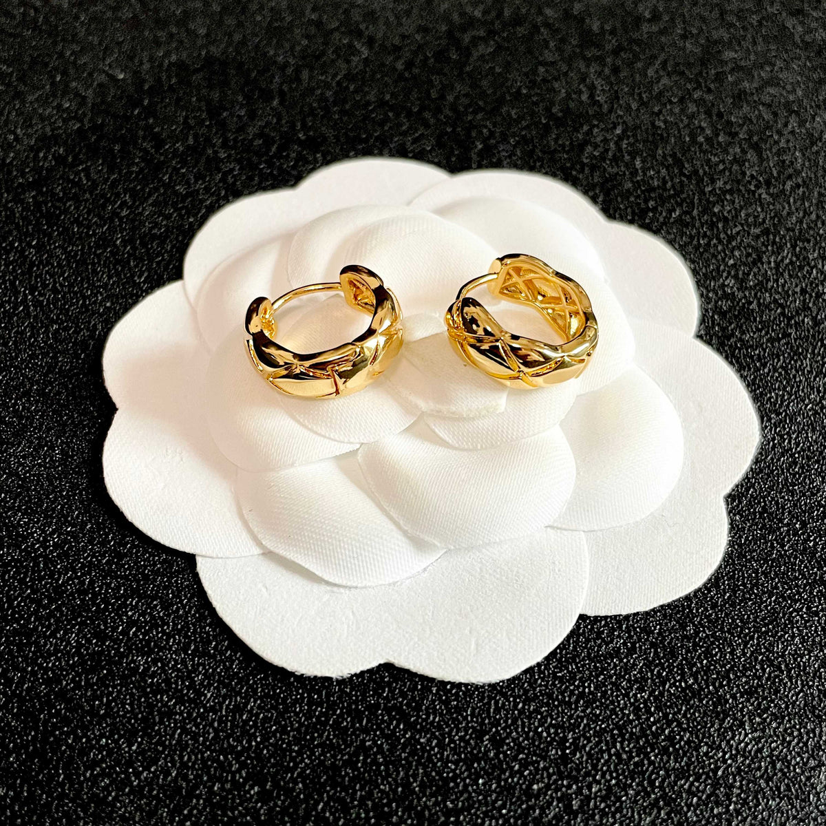 Double-C Emblem Stud Earrings in Polished Metal-Tone – Design 095 front product view