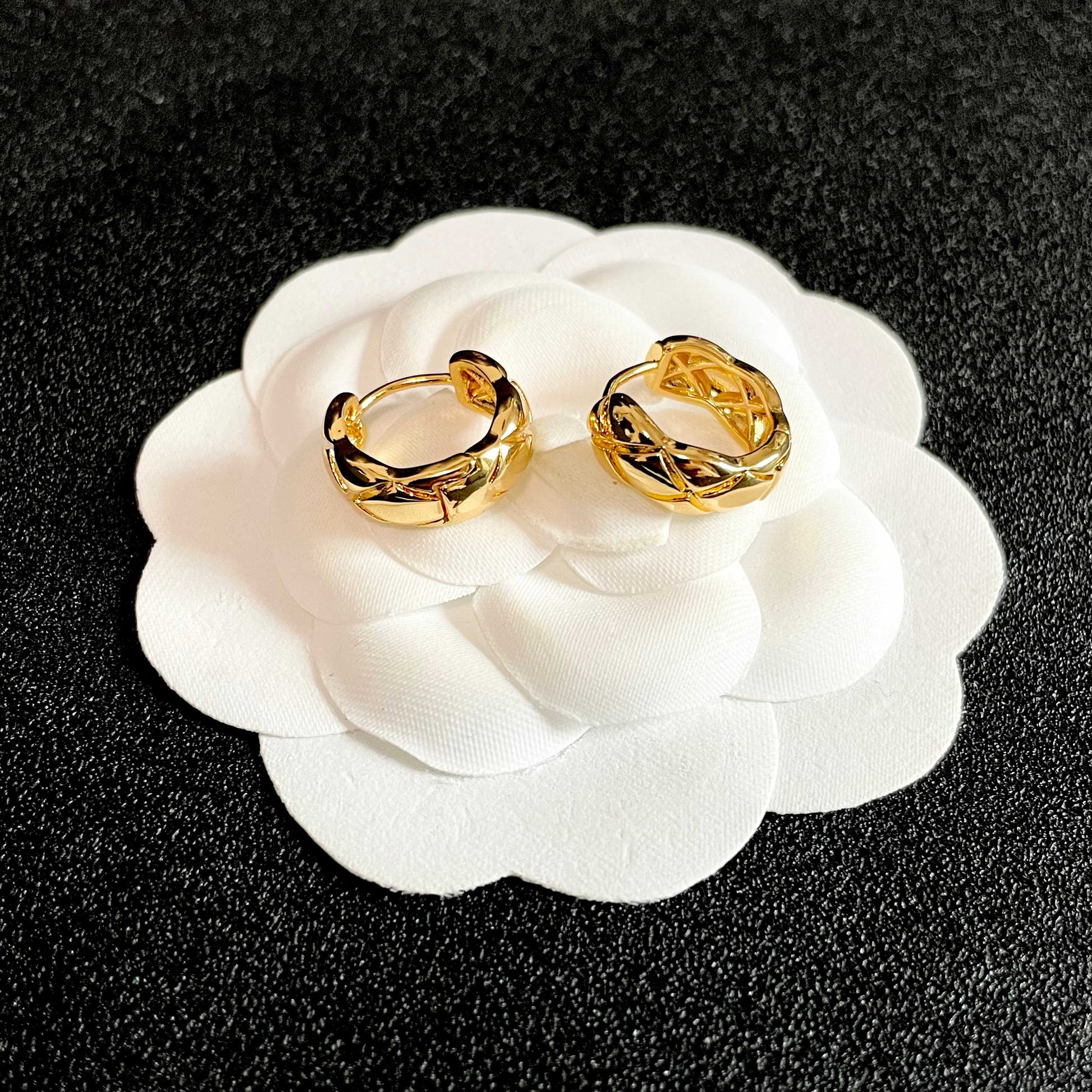 Double-C Emblem Stud Earrings in Polished Metal-Tone – Design 095 front product view