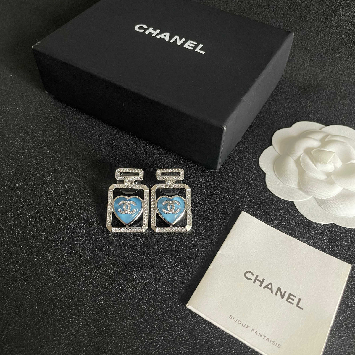 Double-C Emblem Stud Earrings in Polished Metal-Tone – Heart Detail – Design 002 close-up detail