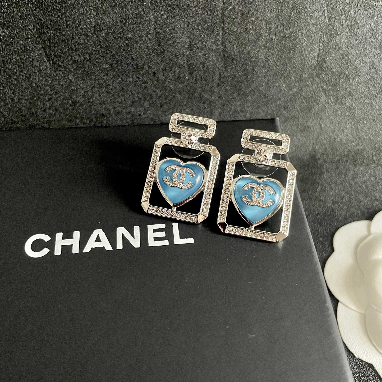 Double-C Emblem Stud Earrings in Polished Metal-Tone – Heart Detail – Design 003 detail view
