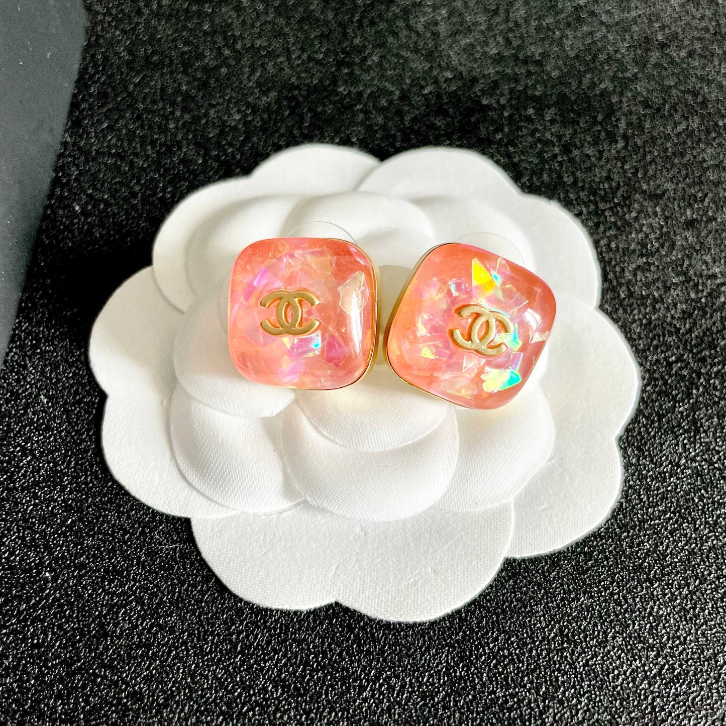 Double-C Emblem Stud Earrings in Polished Metal-Tone – Design 102 front product view