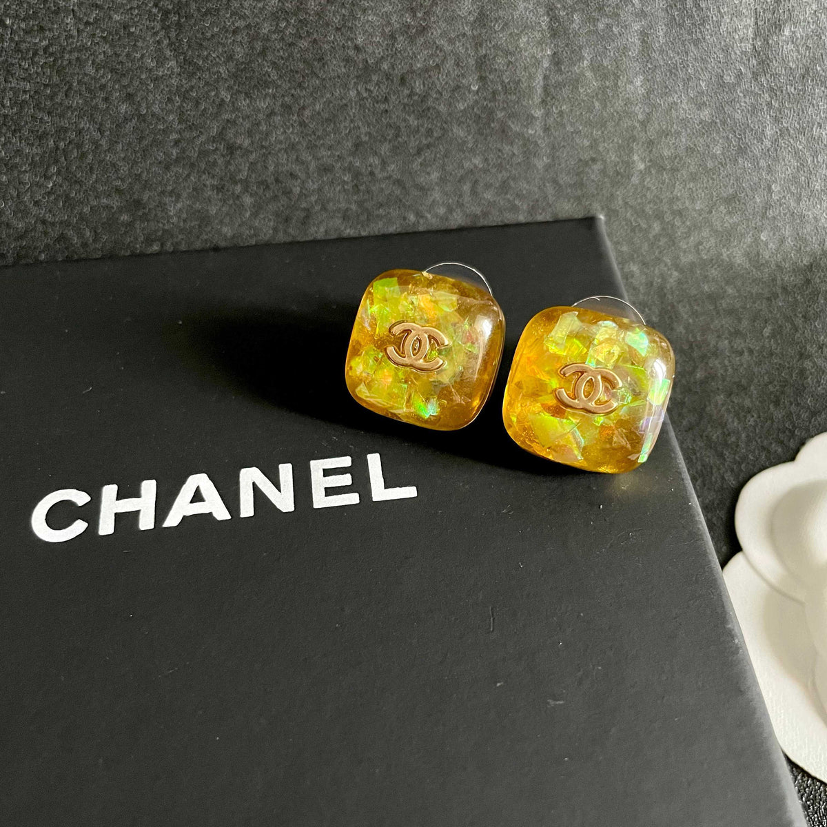 Double-C Emblem Stud Earrings in Polished Metal-Tone – Design 101 detail view