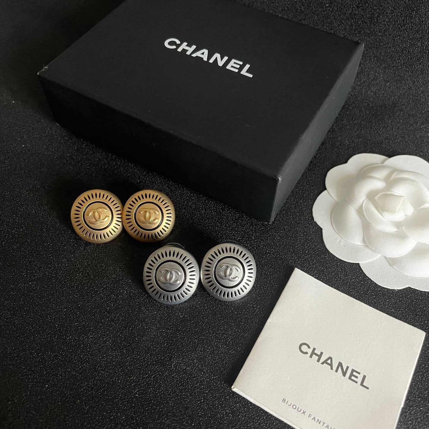 Double-C Emblem Stud Earrings in Polished Metal-Tone – Design 099 close-up detail