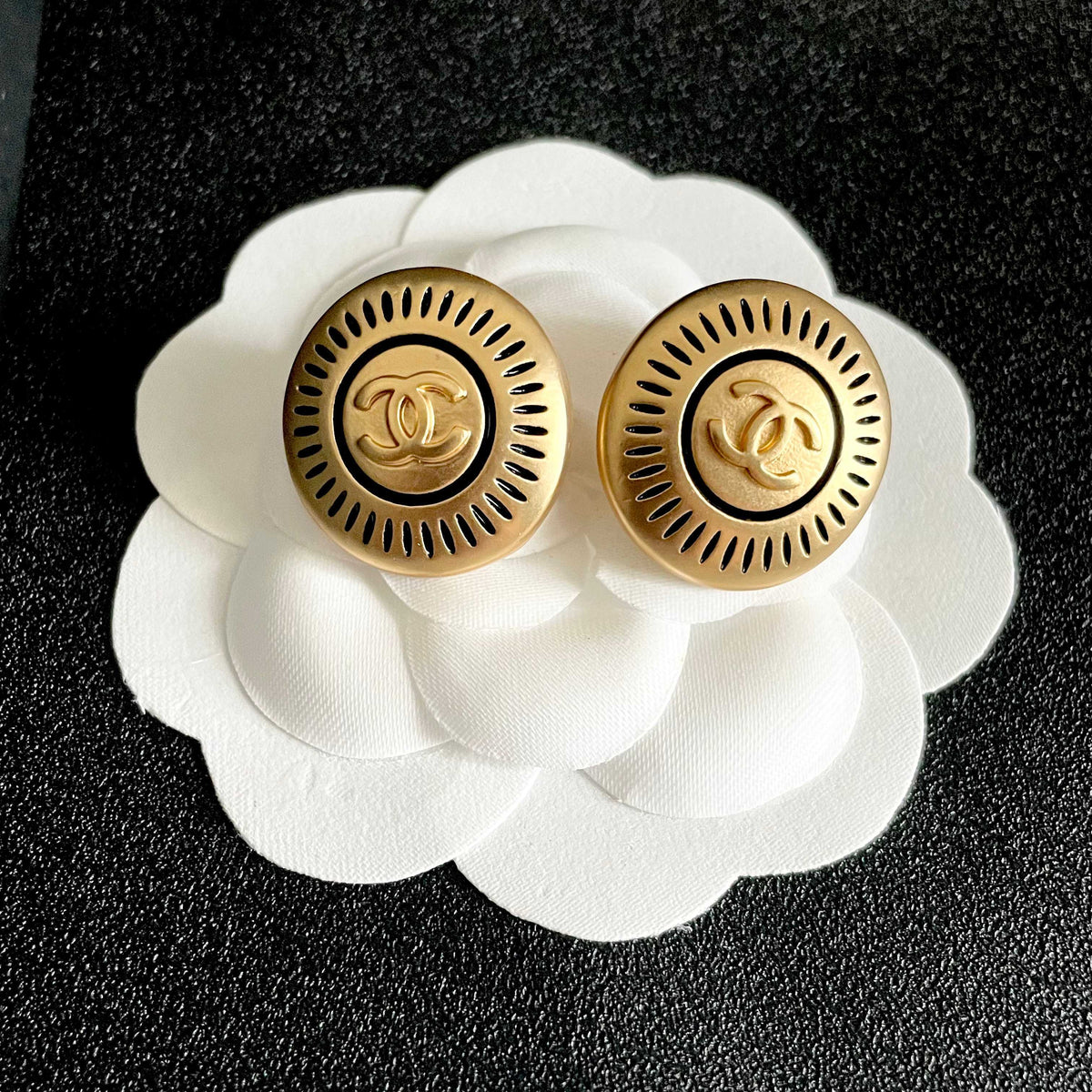 Double-C Emblem Stud Earrings in Polished Metal-Tone – Design 117 front product view