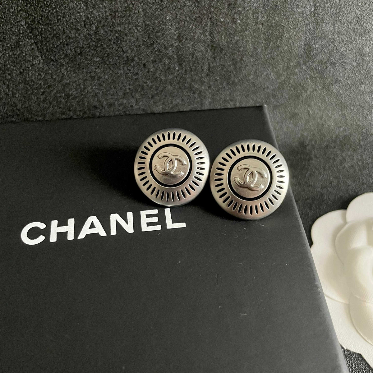 Double-C Emblem Stud Earrings in Polished Metal-Tone – Design 099 detail view