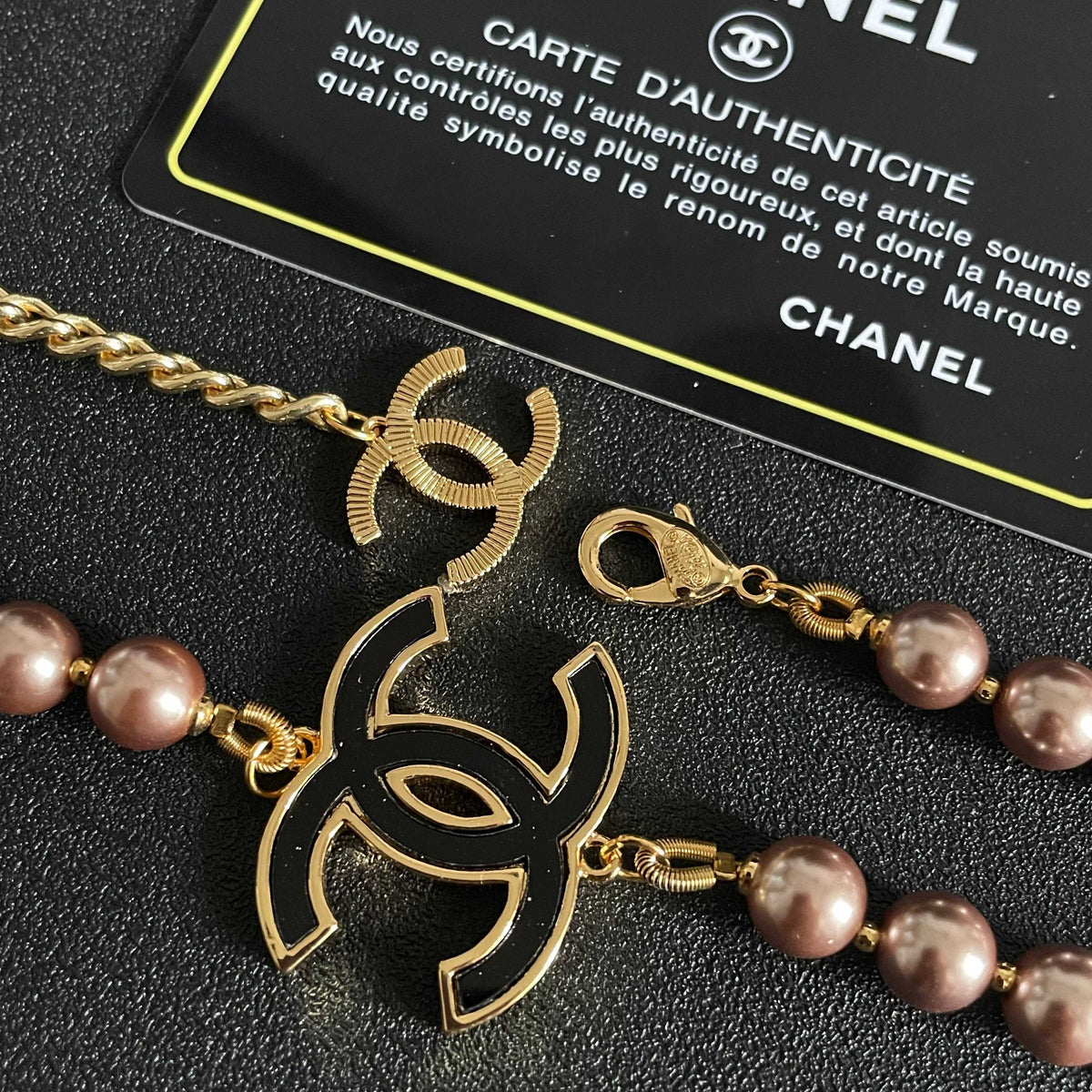 Double-C Emblem Jewelry Accessory in Gold-Tone – Pearl Detail main product view
