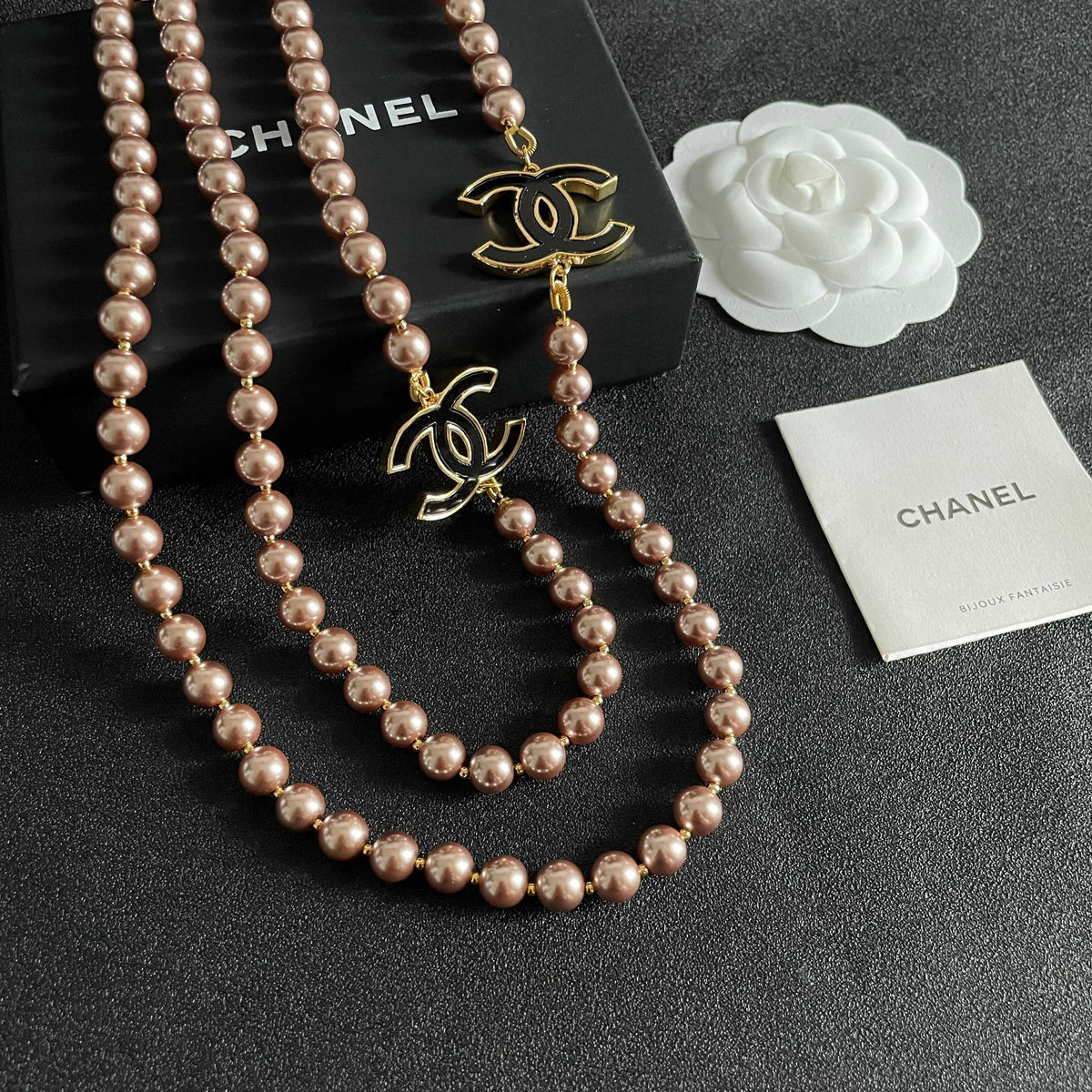 Double-C Emblem Jewelry Accessory in Gold-Tone – Pearl Detail styled product view