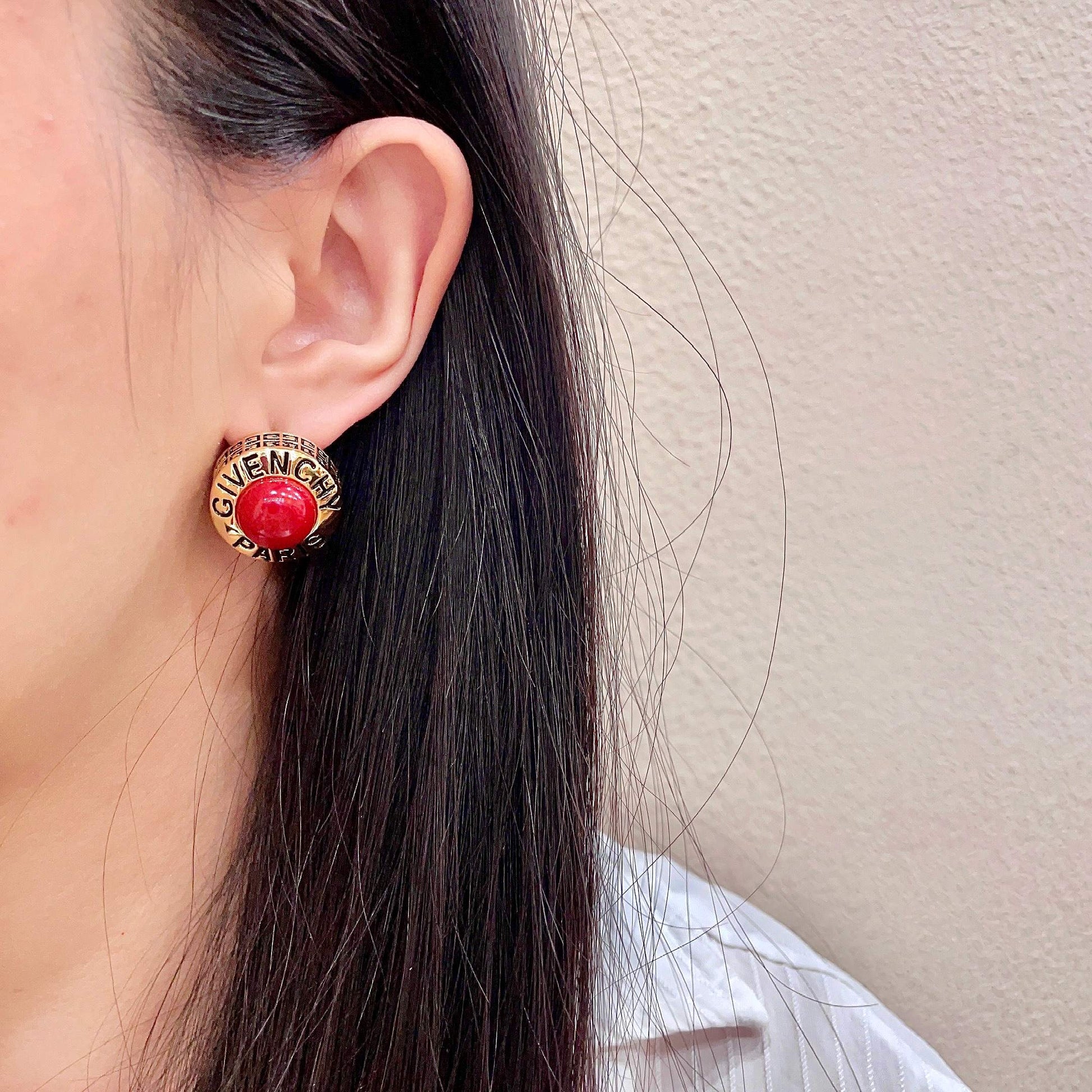 Round Emblem Stud Earrings detail view
