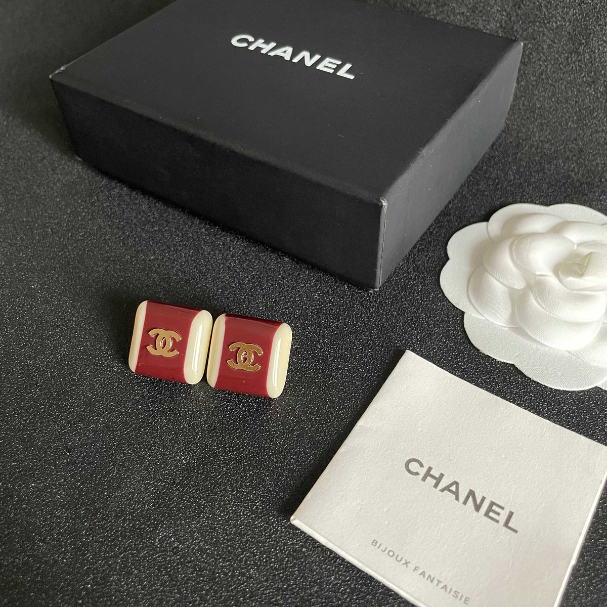Double-C Emblem Stud Earrings in Polished Metal-Tone – Design 091 close-up detail