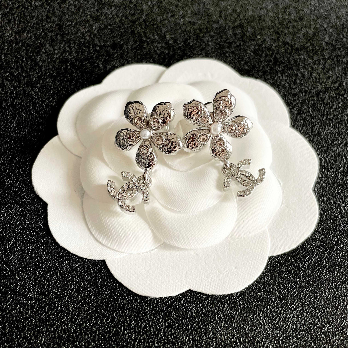 Double-C Emblem Stud Earrings in Polished Metal-Tone – Design 089 front product view