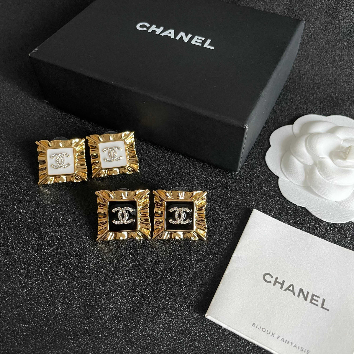 Double-C Emblem Stud Earrings in Polished Metal-Tone – Design 086 close-up detail