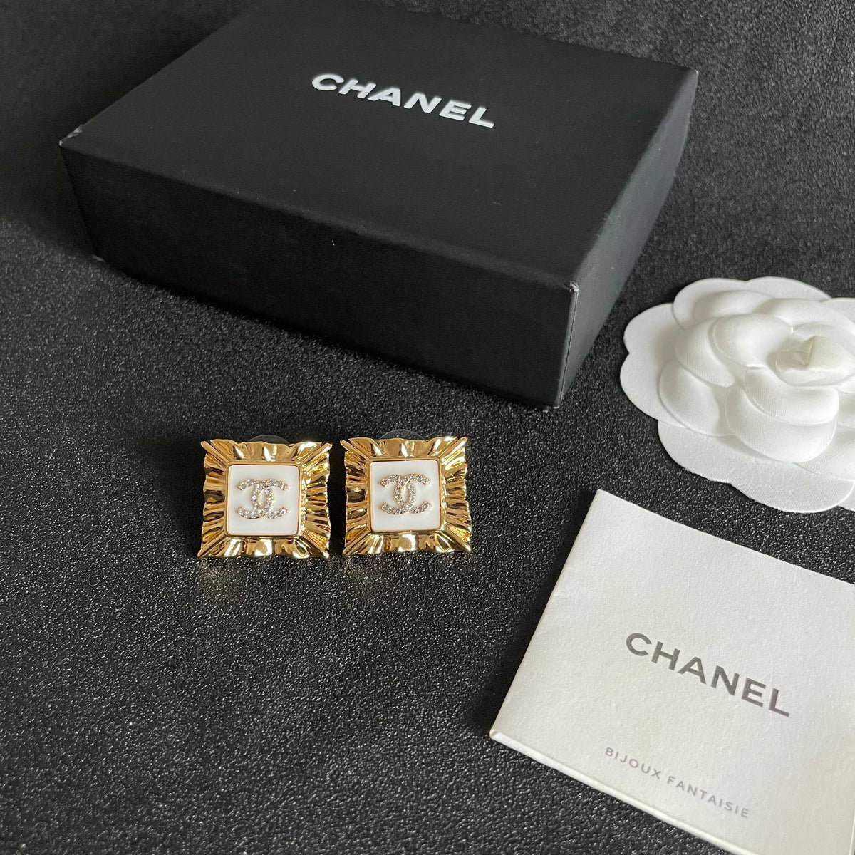Double-C Emblem Stud Earrings in Polished Metal-Tone – Design 085 close-up detail