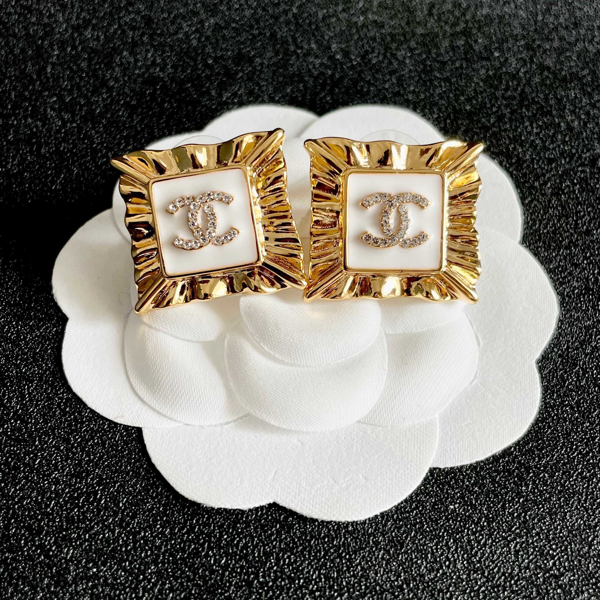 Double-C Emblem Stud Earrings in Polished Metal-Tone – Design 085 front product view