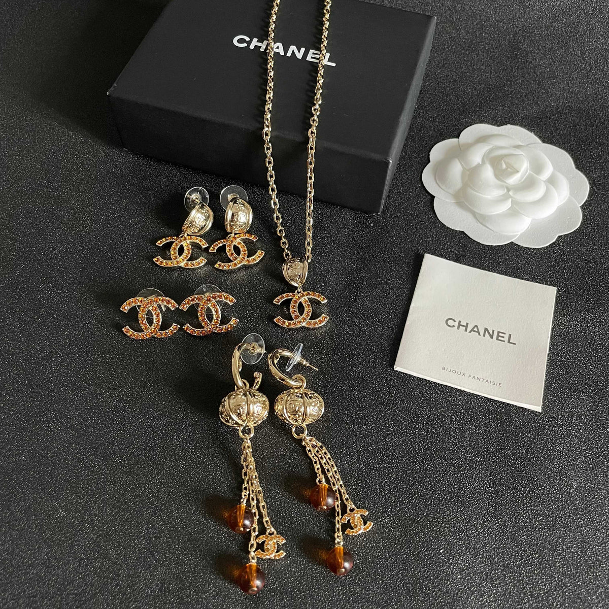 Double-C Emblem Crystal-Accent Stud Earrings – Design 001 close-up detail