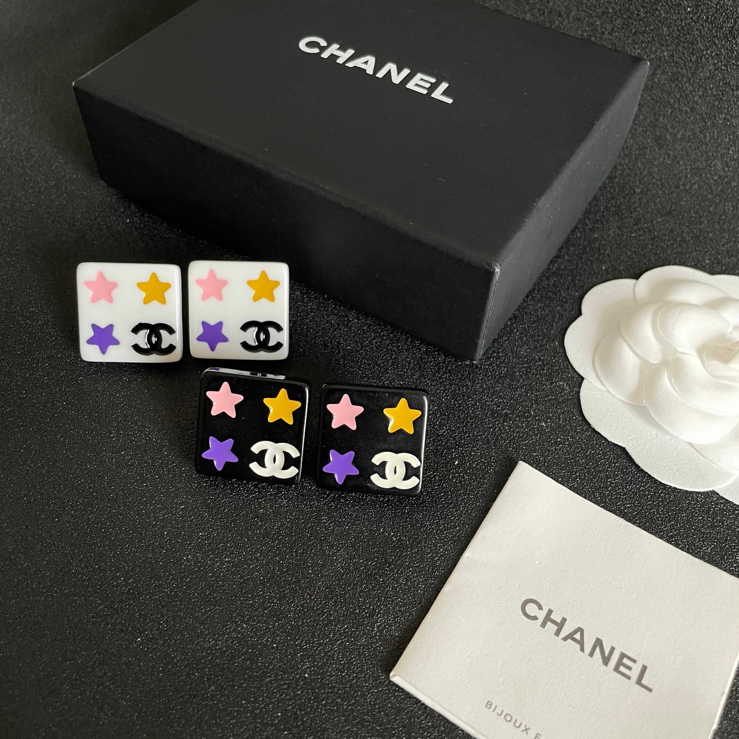 Double-C Emblem Stud Earrings in Polished Metal-Tone – Star Detail – Design 002 close-up detail