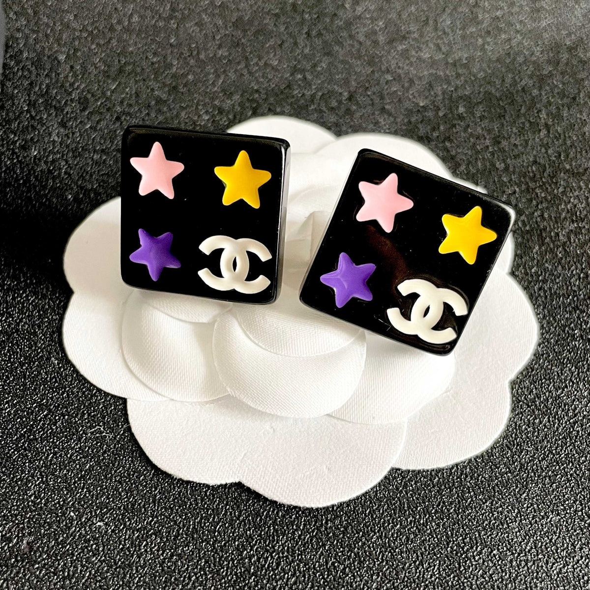 Double-C Emblem Stud Earrings in Polished Metal-Tone – Star Detail – Design 002 front product view