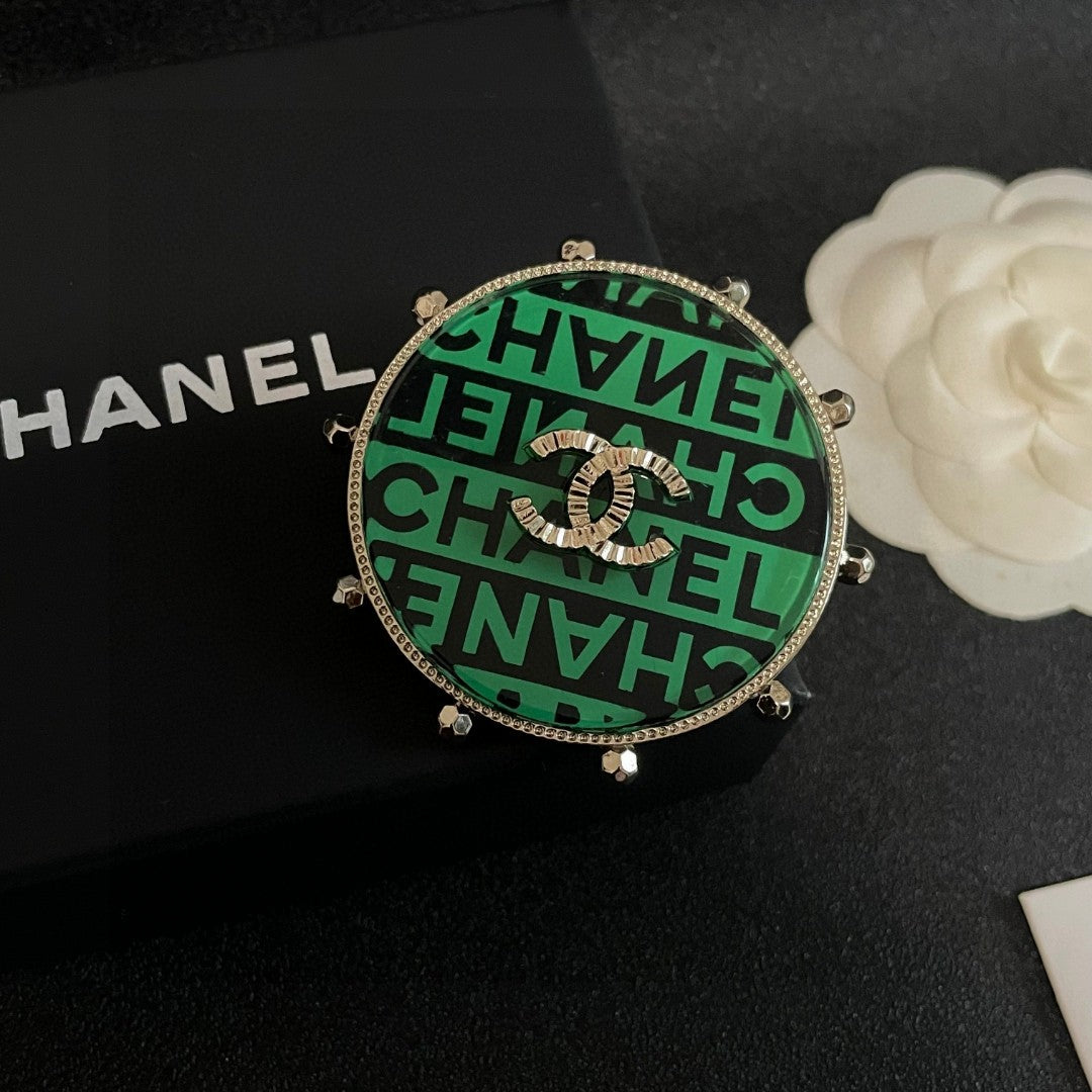 Double-C Emblem Brooch in Polished Metal-Tone – Design 001 detail view