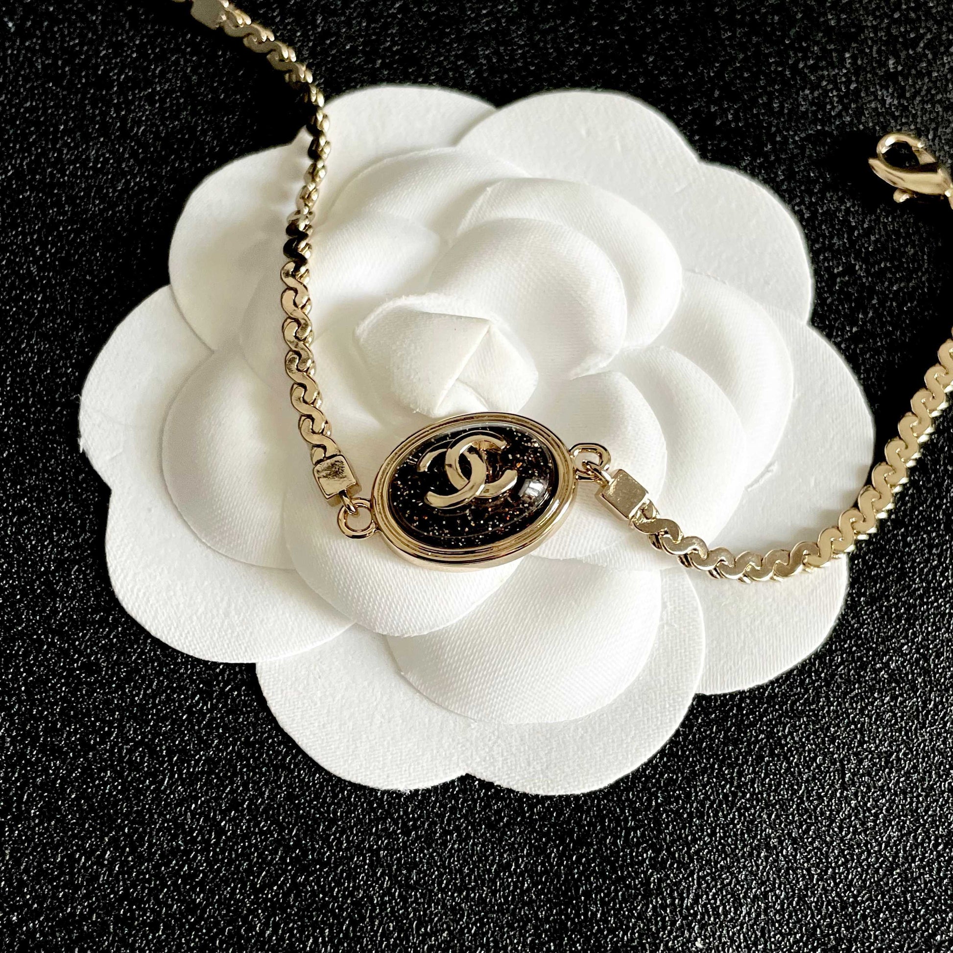 Double-C Emblem Bracelet in Polished Metal-Tone – Design 001 main product view