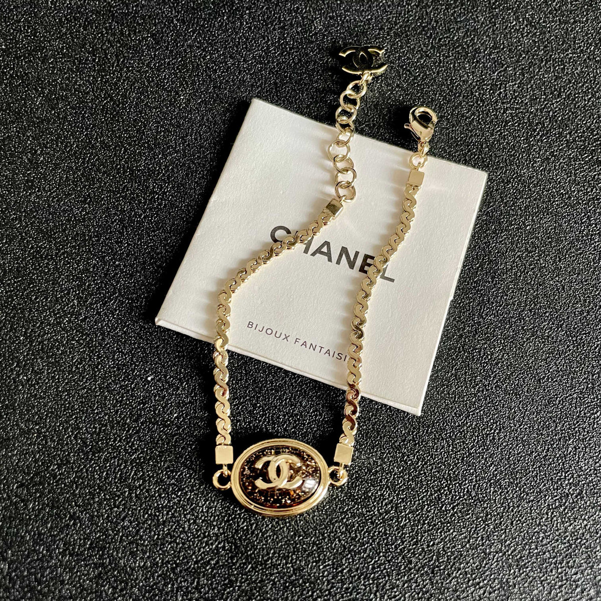 Double-C Emblem Bracelet in Polished Metal-Tone – Design 001 detail view