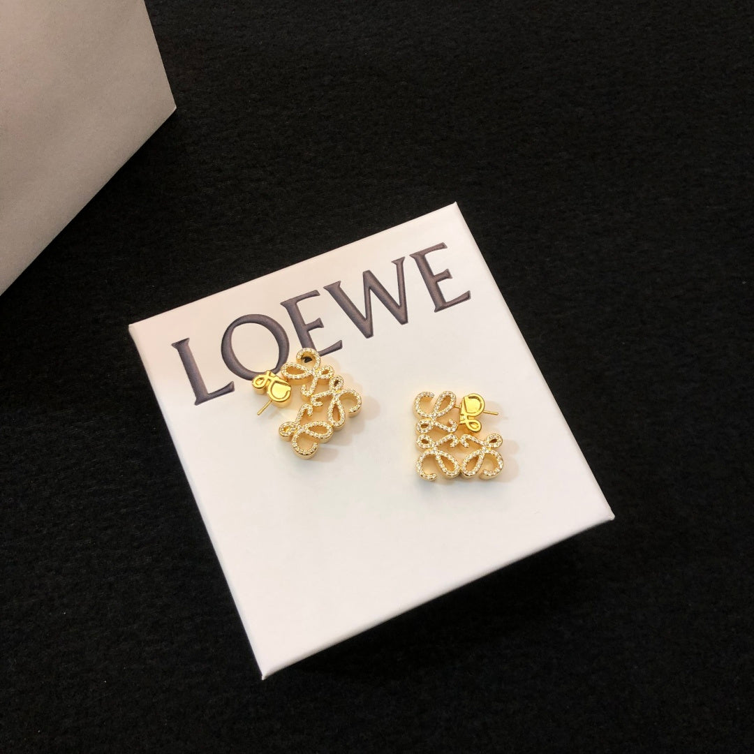 Floral Motif Stud Earrings in Polished Metal-Tone with Crystal-Style Accents front view