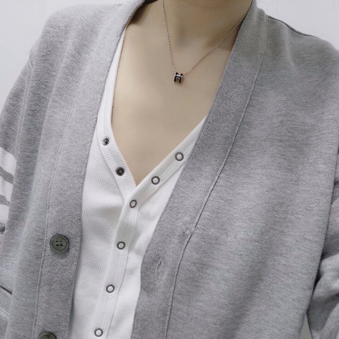 Geometric Emblem Pendant Necklace in Silver-Tone – Gold Detail detail view