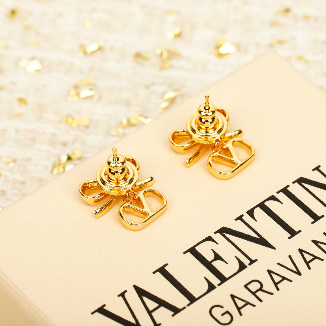 Bow Statement Earrings in Polished Metal-Tone side detail