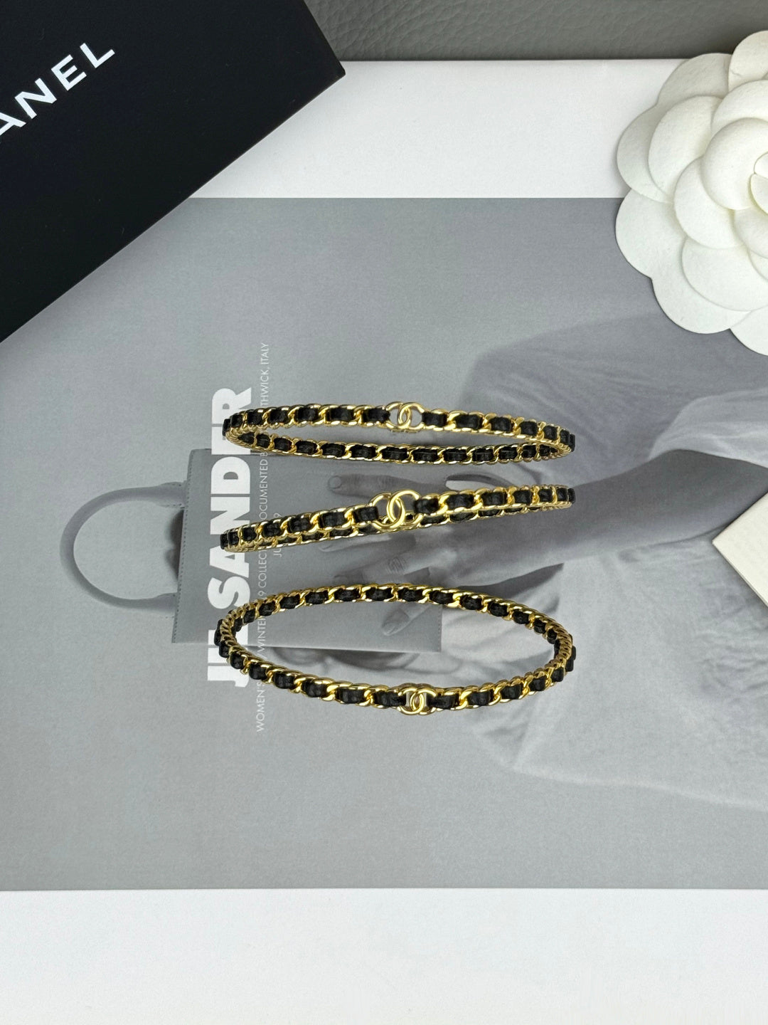 Signature Emblem Bangle in Black-Tone detail view