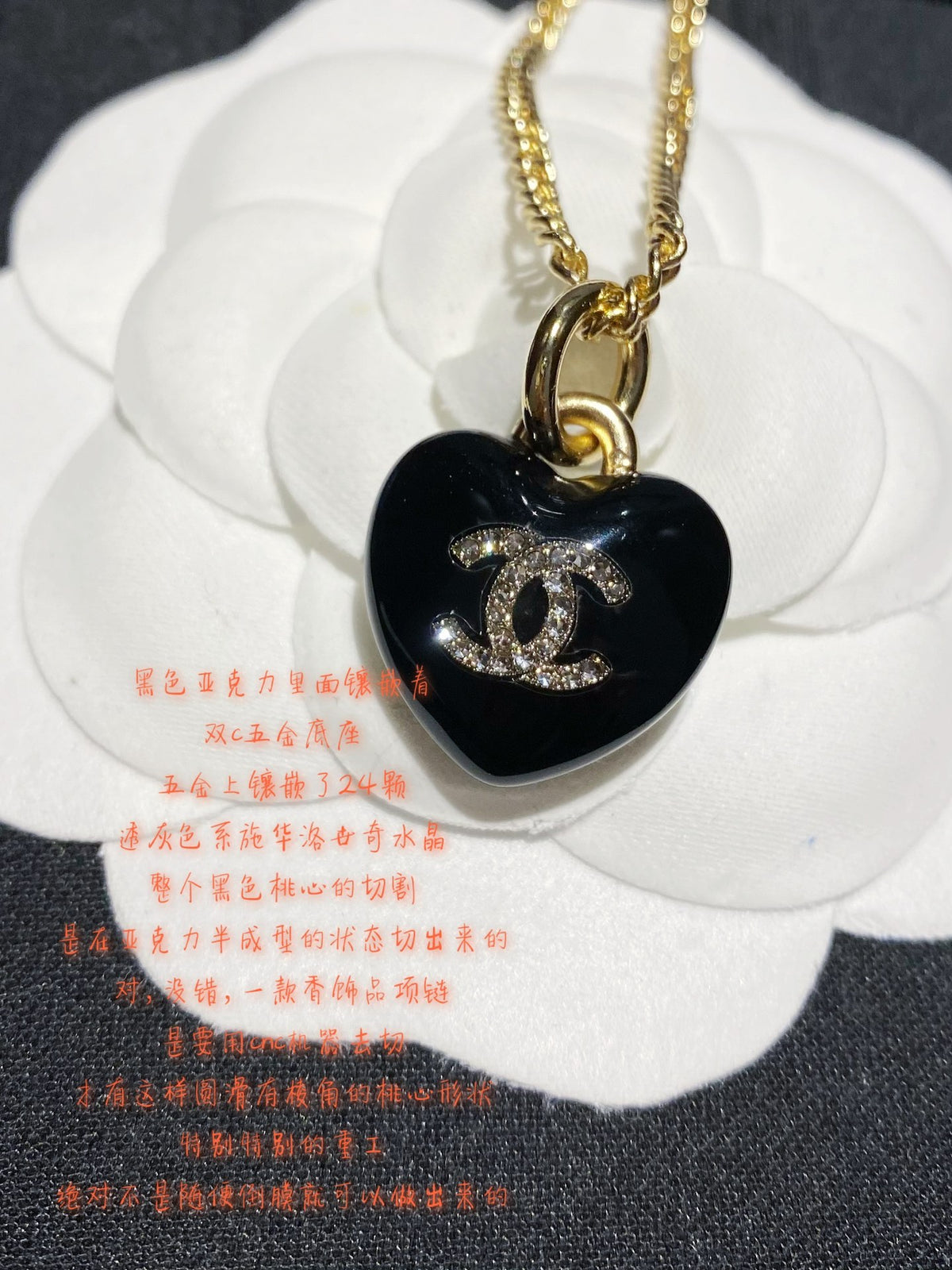 Double-C Emblem Crystal-Accent Pendant Necklace – Heart Detail close-up detail