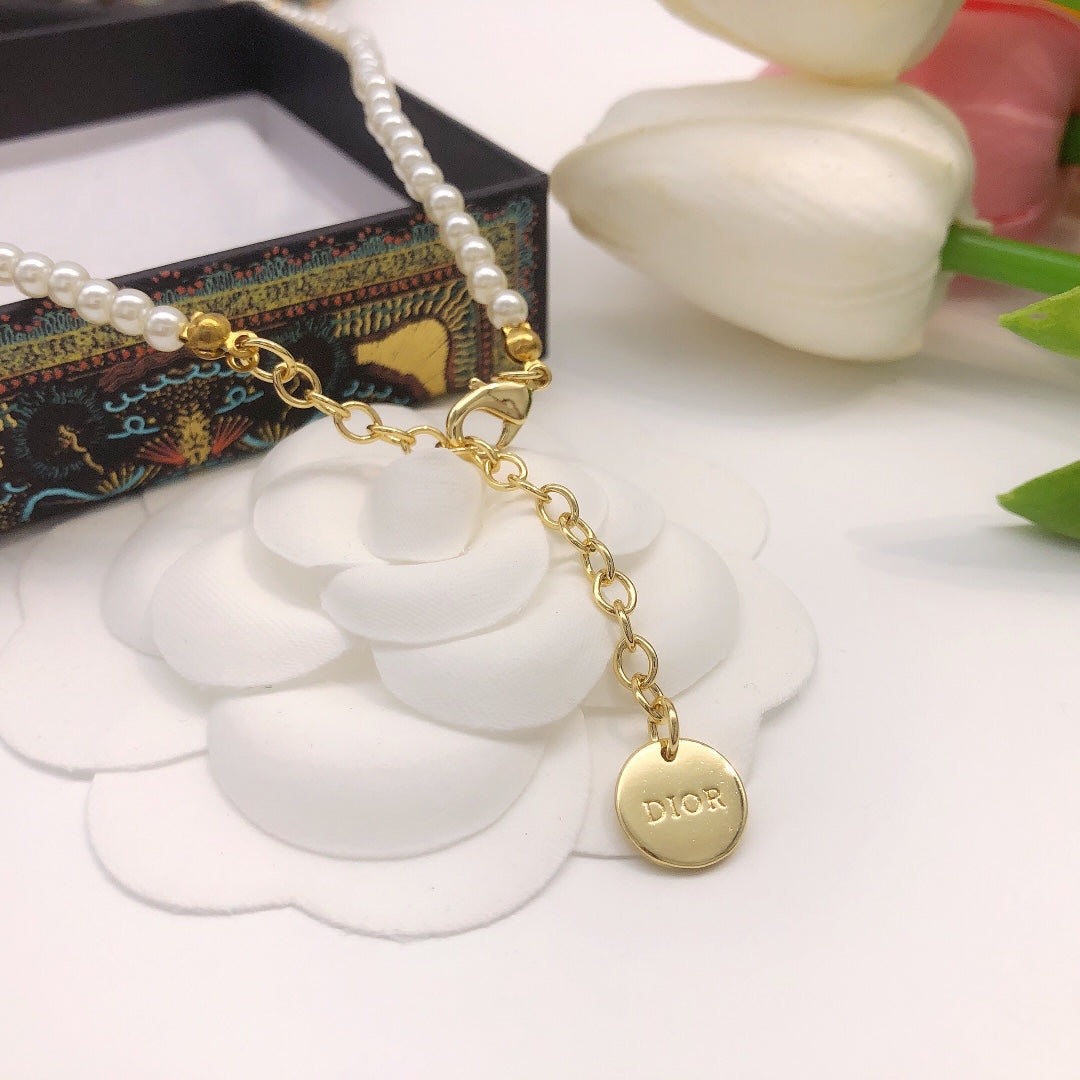 Pearl-Style Motif Pendant Necklace in Polished Metal-Tone with Pearl-Style Detail – Design 005 side detail