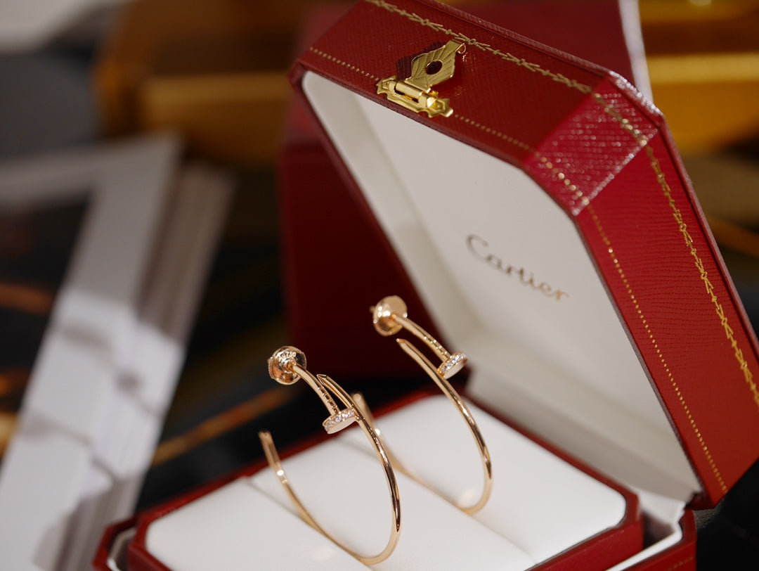 Nail Motif Earrings in Polished Metal-Tone with Crystal-Style Accents front view