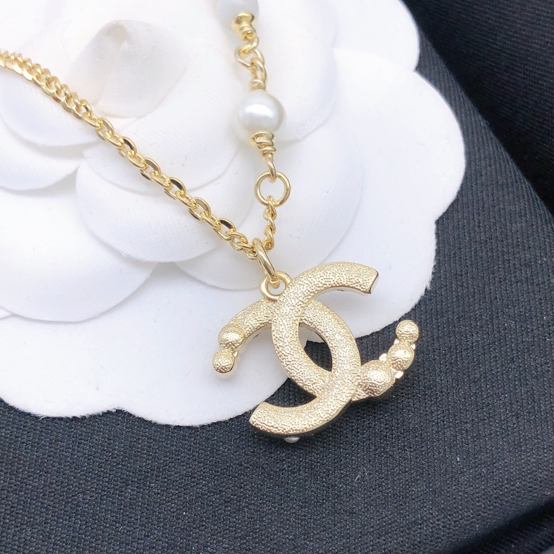 Signature Emblem Pendant Necklace in Polished Metal-Tone – Design 048 side detail