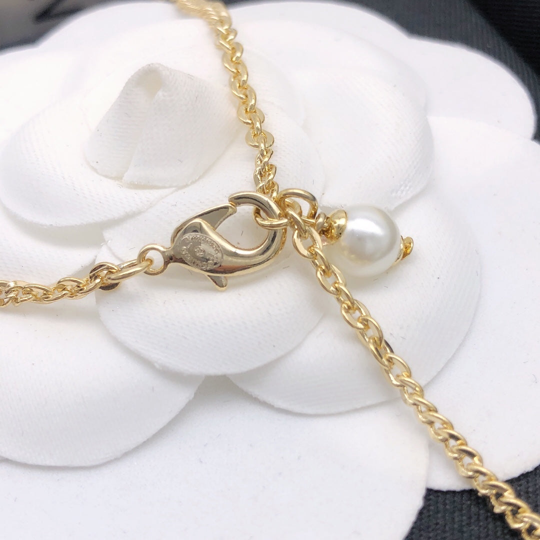 Signature Emblem Pendant Necklace in Polished Metal-Tone – Design 048 close-up detail