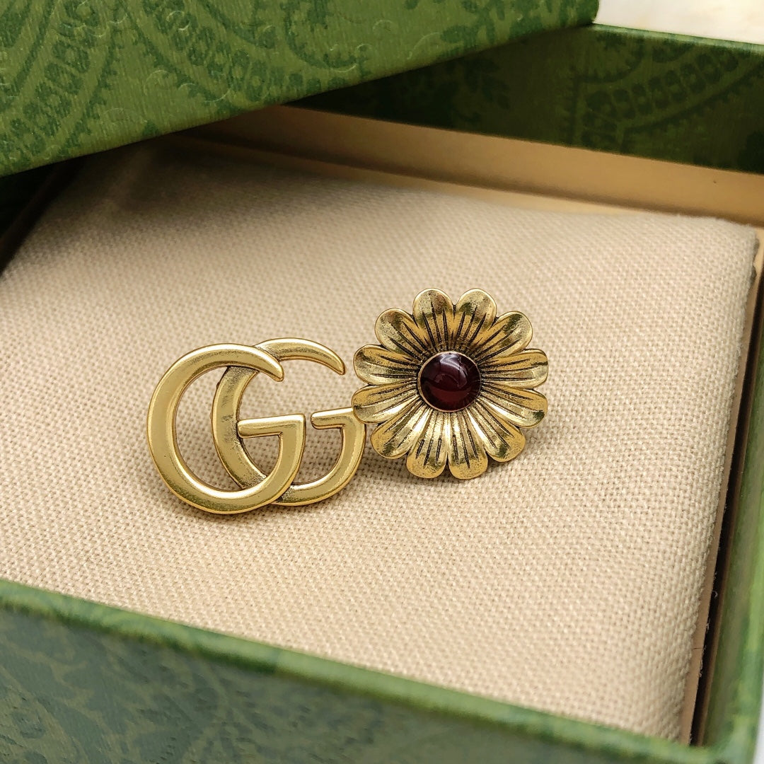 Floral Motif Statement Earrings in Polished Metal-Tone close-up detail