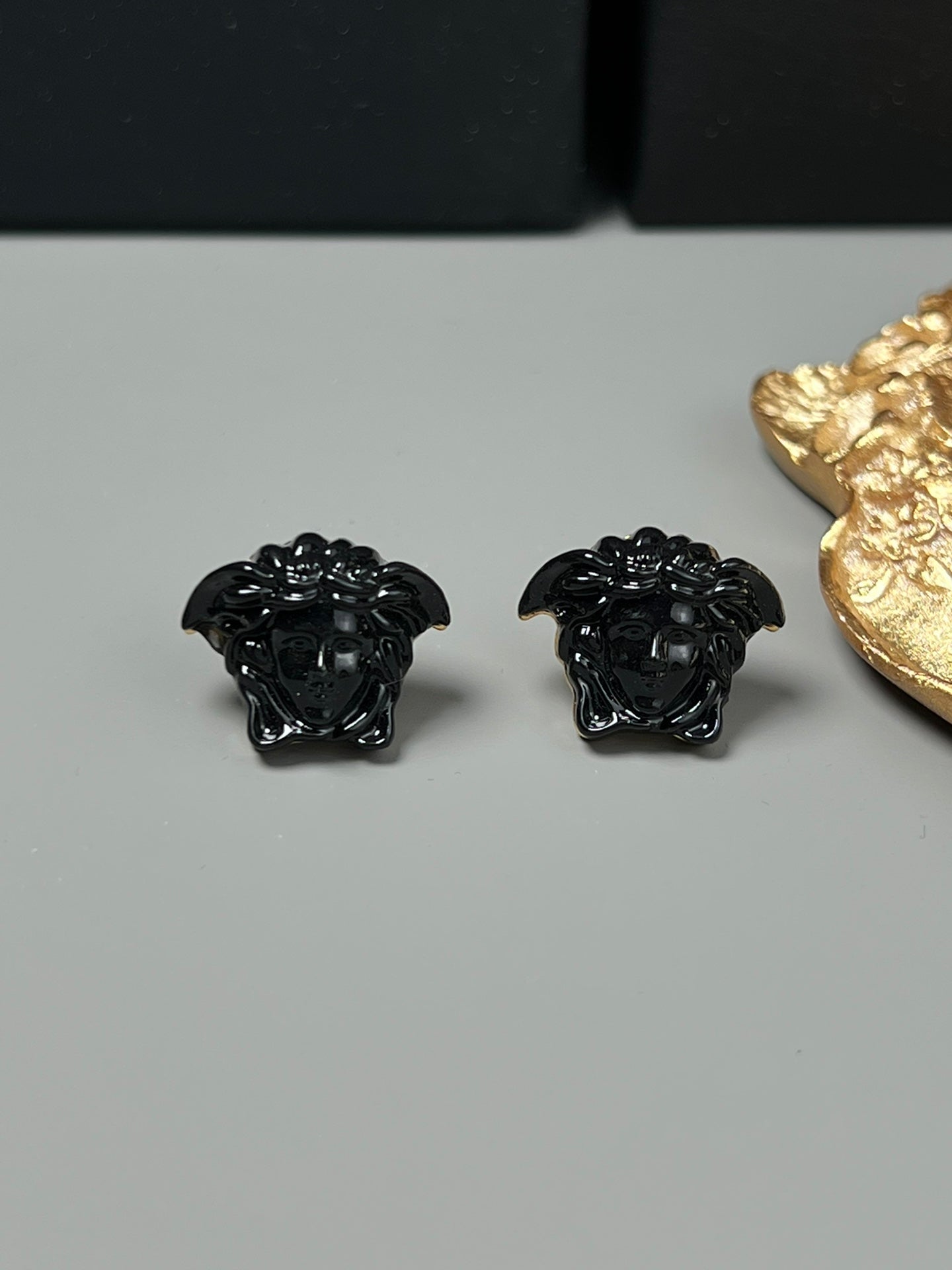 Statement Emblem Stud Earrings in Black-Tone – Streetwear detail view