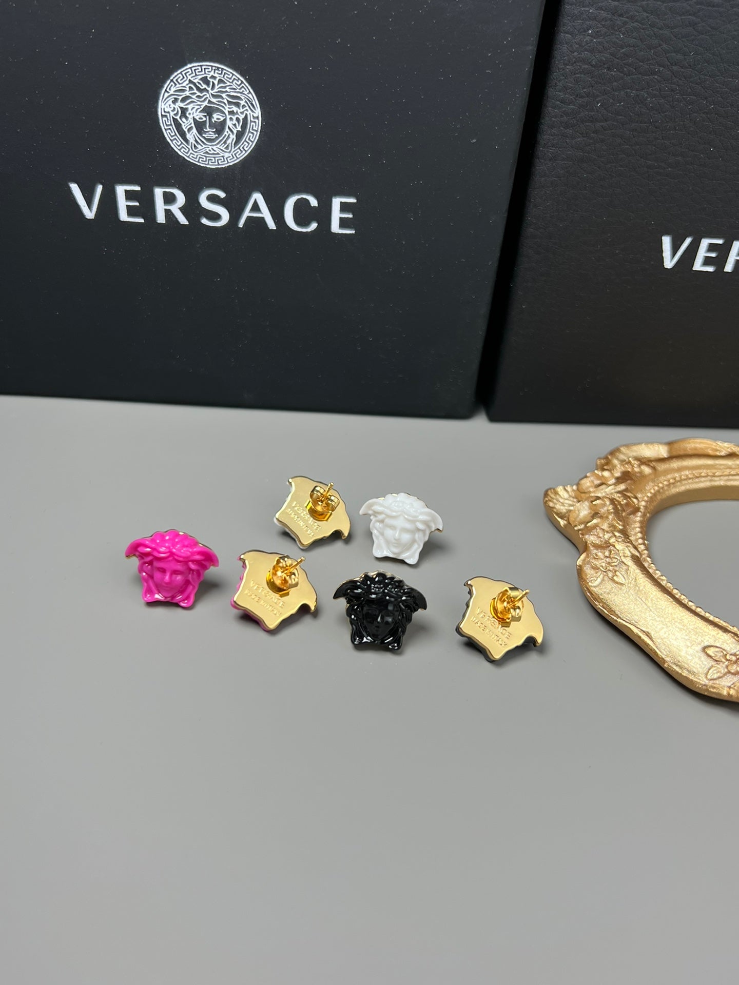 Statement Emblem Stud Earrings in Black-Tone – Streetwear front product view