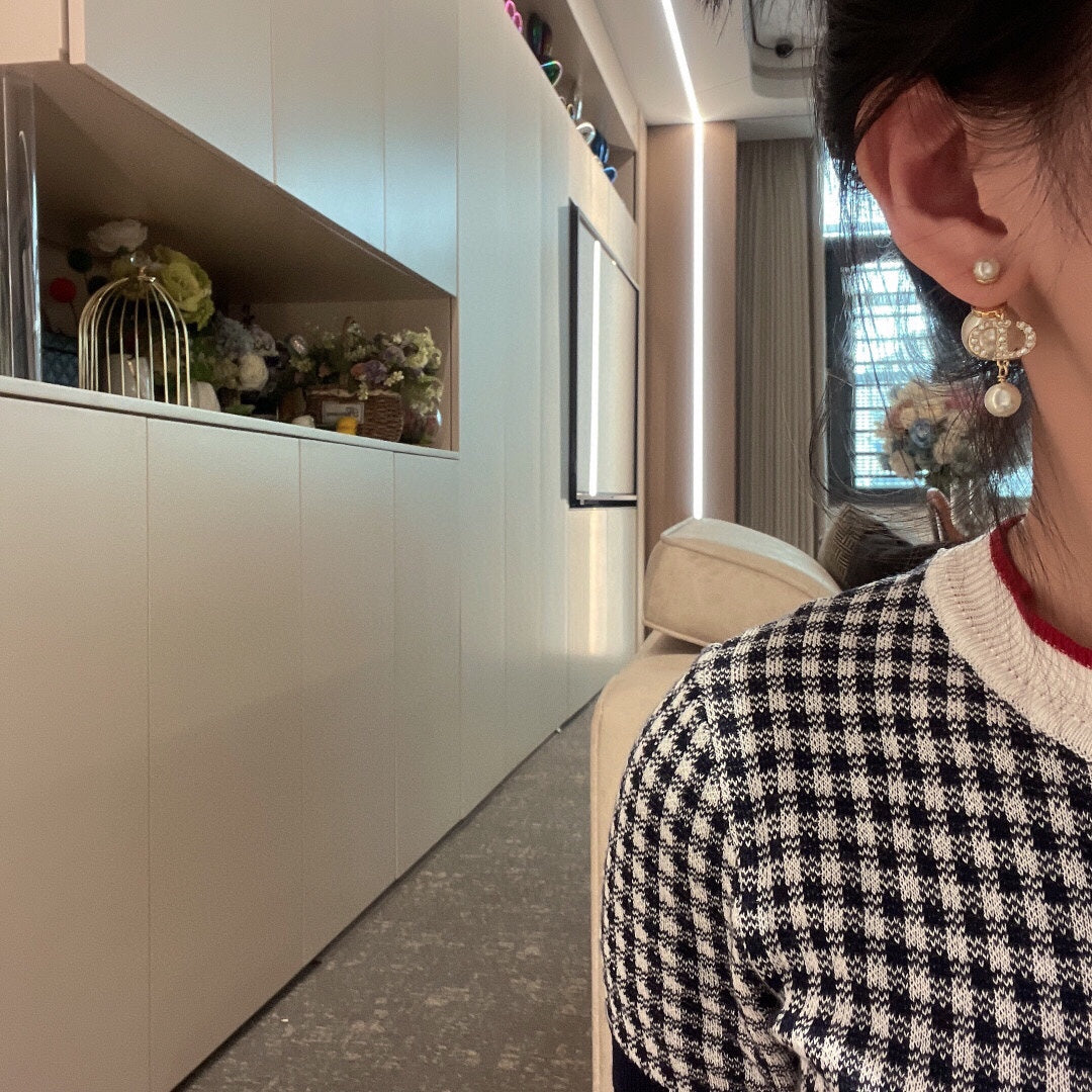Pearl-Style Motif Stud Earrings in Polished Metal-Tone with Pearl-Style Detail – Design 010 styled view