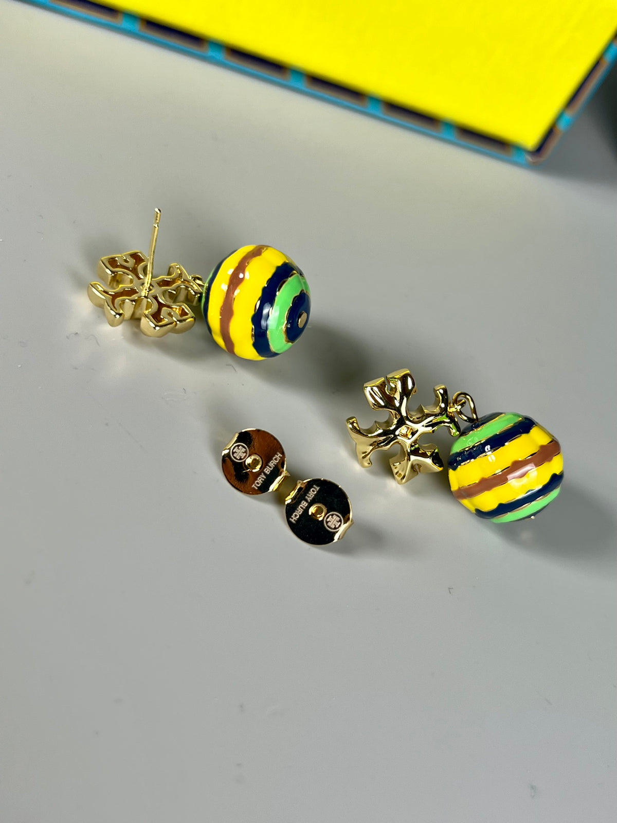 Signature Emblem Stud Earrings in Polished Metal-Tone – Design 011 front product view