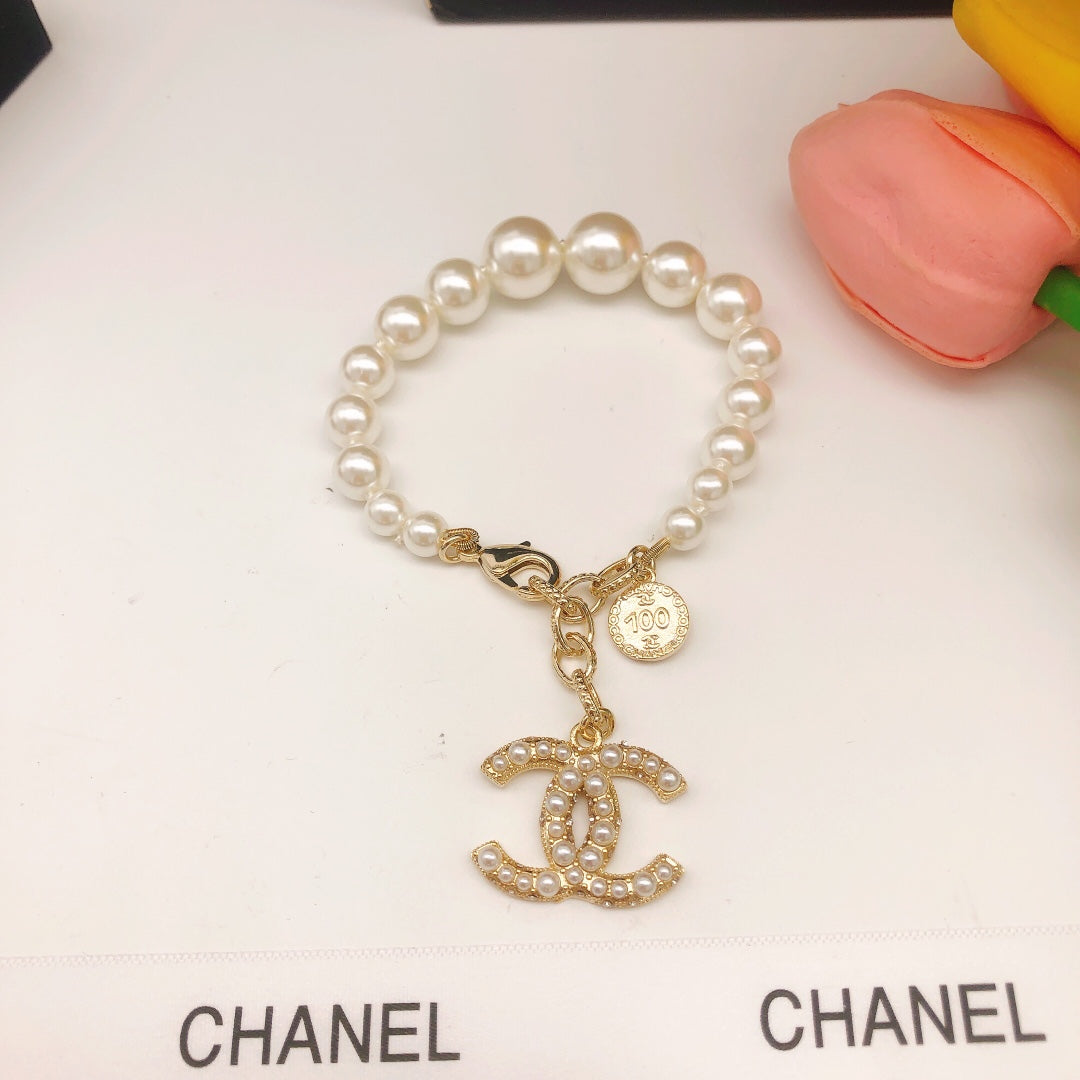 Double-C Emblem Bracelet in Gold-Tone – Pearl Detail – Design 002 front product view