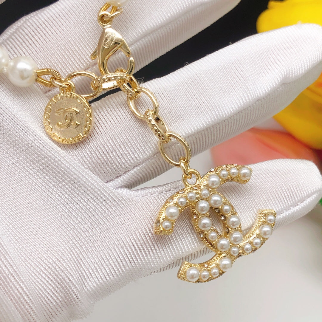 Double-C Emblem Bracelet in Gold-Tone – Pearl Detail – Design 002 detail view