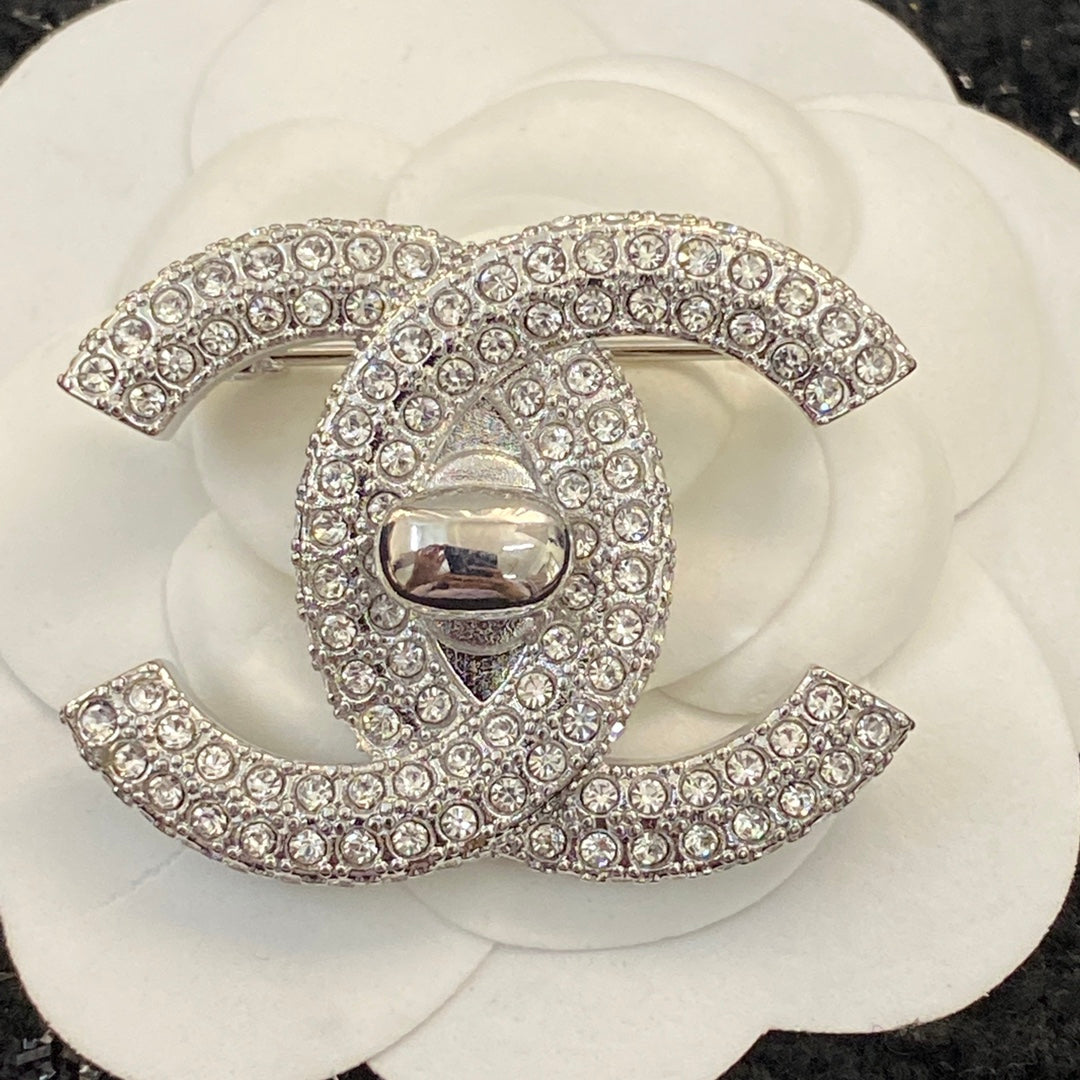 Double-C Emblem Brooch in Polished Metal-Tone – Design 007 styled product view