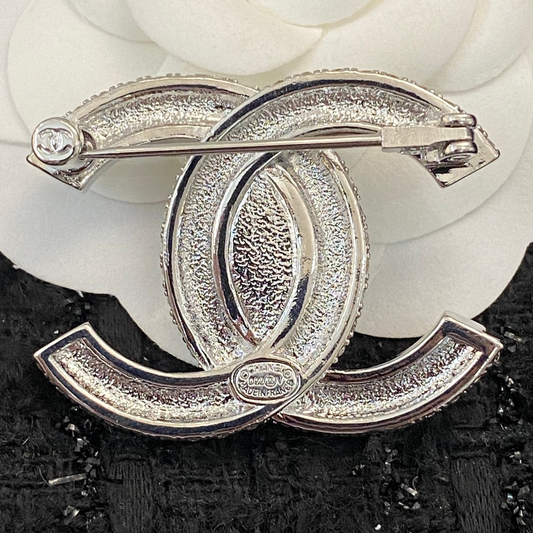 Double-C Emblem Brooch in Polished Metal-Tone – Design 007 detail view