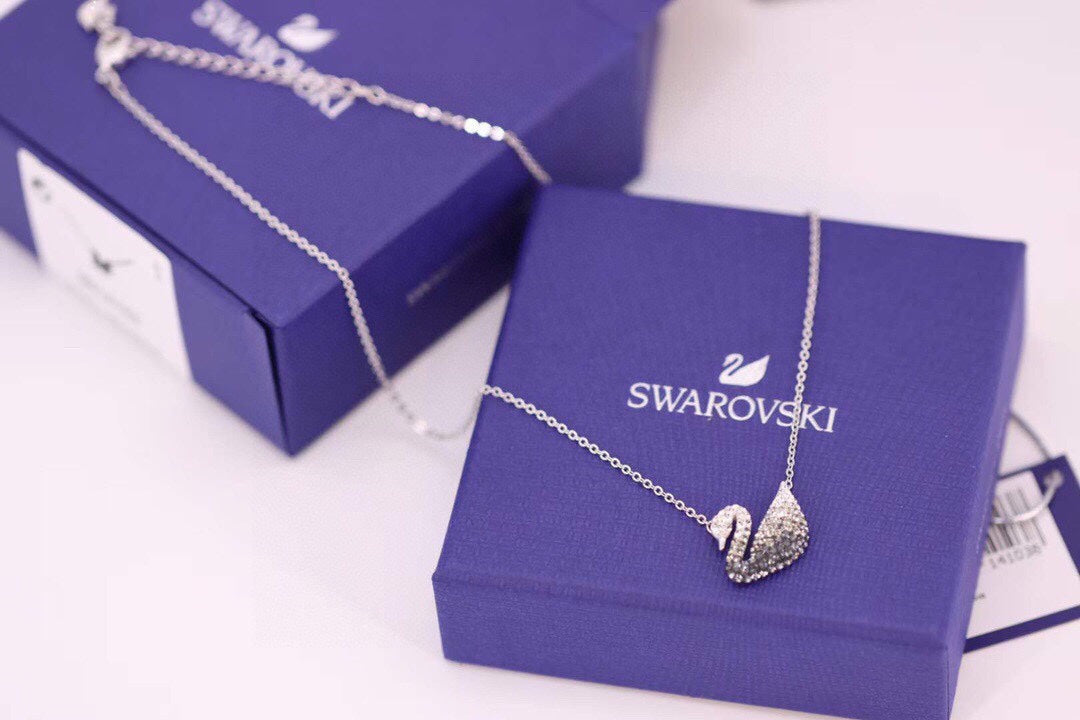 Swan Pendant Necklace in Gold-Tone – Black Detail close-up detail