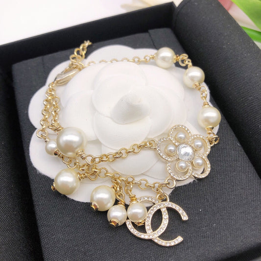 Double-C Emblem Bracelet in Gold-Tone – Pearl Detail – Design 005 main product view