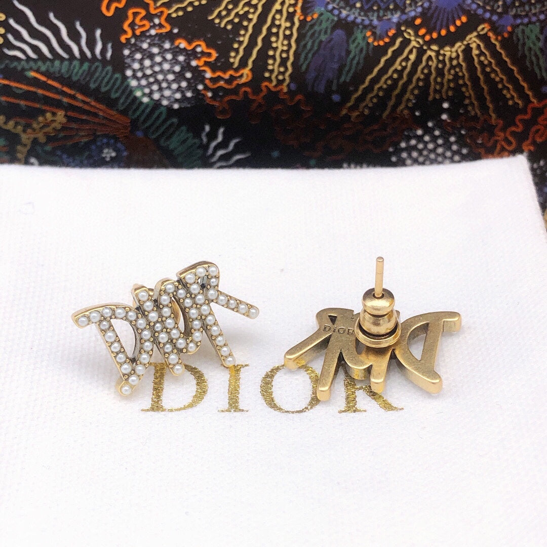 Graphic Letter Motif Stud Earrings in Silver-Tone – Design 002 detail view
