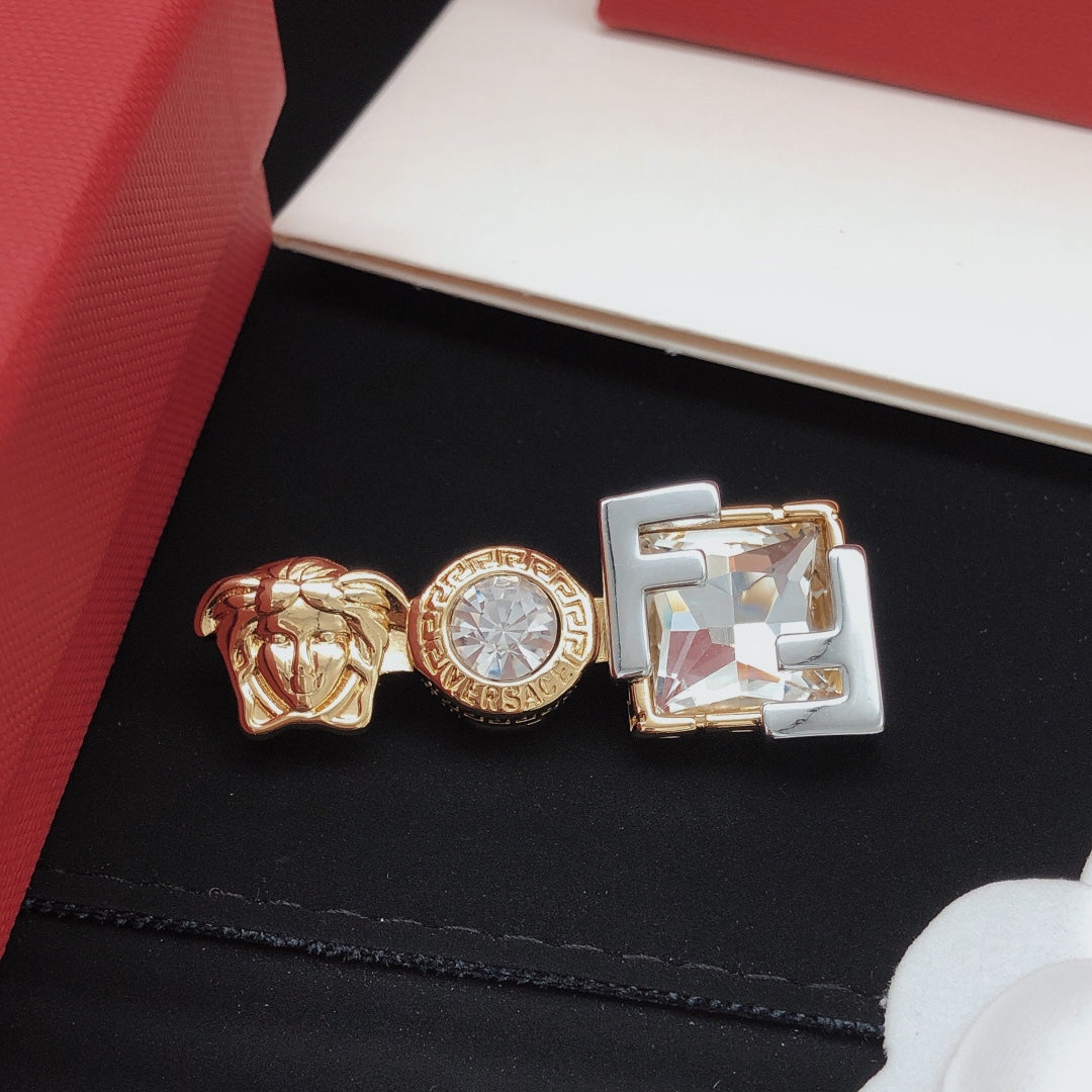 Statement Emblem Brooch Pin in Polished Metal-Tone close-up detail